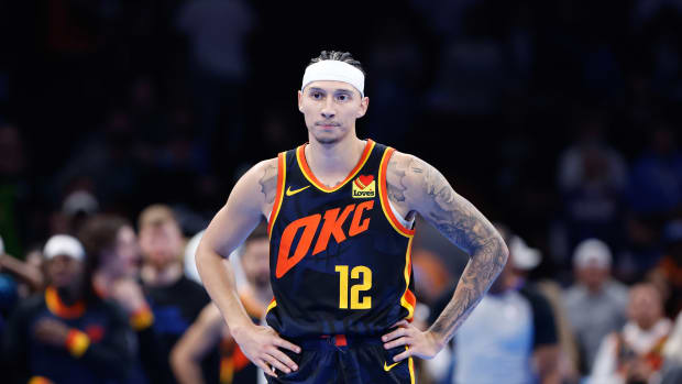 Nov 14, 2023; Oklahoma City, Oklahoma, USA; Oklahoma City Thunder forward Lindy Waters III (12) during a time out against the San Antonio Spurs in the second half at Paycom Center. Mandatory Credit: Alonzo Adams-USA TODAY Sports